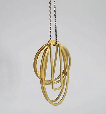 EQUI/06 six brass geometric shapes necklace